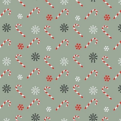 tissu patchwork de Noël, sur fond vert avec des sucres d'orges