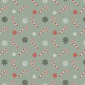 tissu patchwork de Noël, sur fond vert avec des sucres d'orges