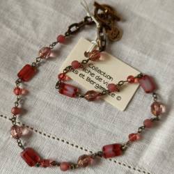 collier en perles coloris pêche de vigne rosé
