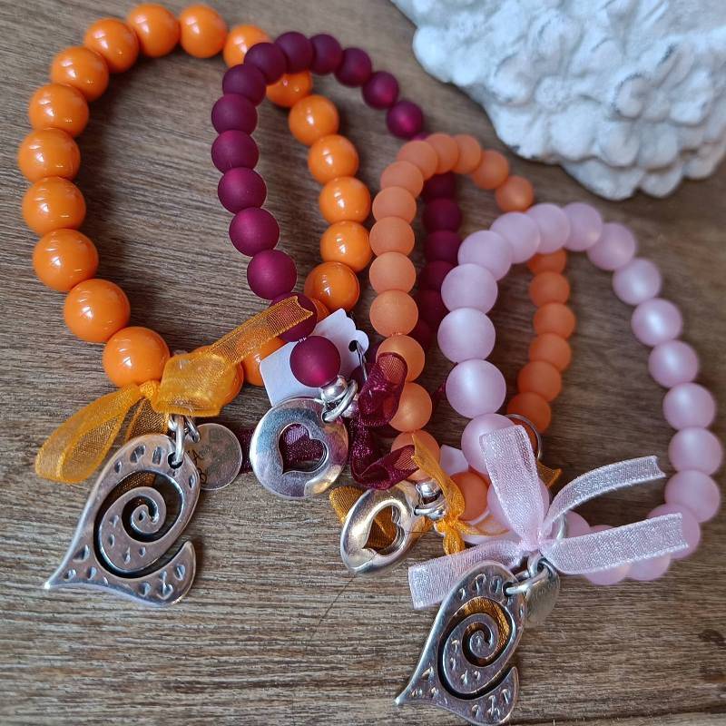 bracelets en perles résine polaris orange, rouge et améthyste claire bracelets en perles résine polaris orange, rouge et améthyste claire